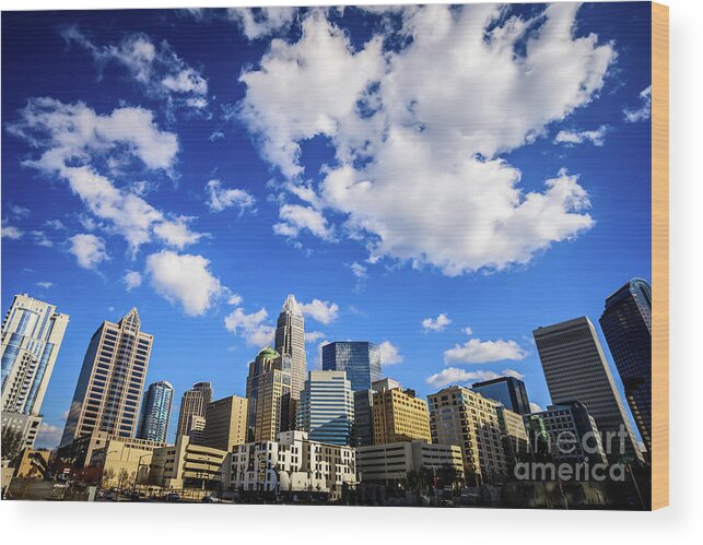 121 West Trade Wood Print featuring the photograph Charlotte Skyline Blue Sky and Clouds by Paul Velgos