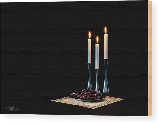 Cherries And Candles In Steel Wood Print featuring the photograph Cherries and candles in steel by Torbjorn Swenelius