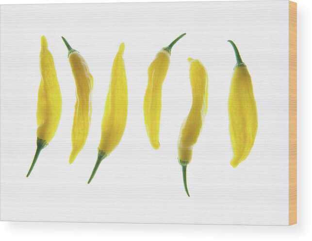 Chilies Wood Print featuring the photograph Chillies Lined Up ii by Helen Jackson