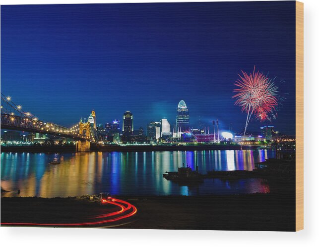 Cincinnati Ohio Skyline Fireworks Twilight Light Trails Water River Reflection Wood Print featuring the photograph Cincinnati Boom by Keith Allen