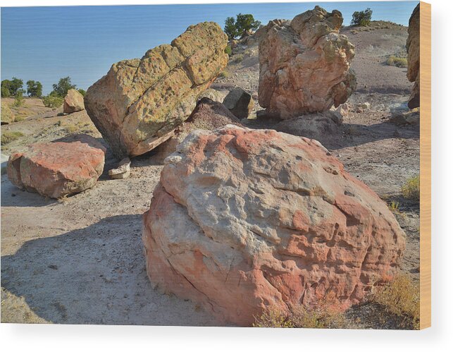 Grand Junction Wood Print featuring the photograph Colorful Boulders in the Bentonite Site on Little Park Road by Ray Mathis