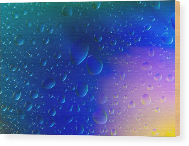 Abstract Wood Print featuring the photograph Colorfull Water drop background abstract by Michalakis Ppalis