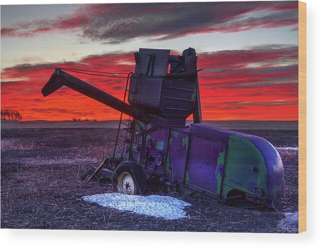 Combine Harvester Antique Abandoned Vintage John Deere Sunrise Landscape Red Green Snow Winter Wood Print featuring the photograph Combine Towards the Light by Peter Herman