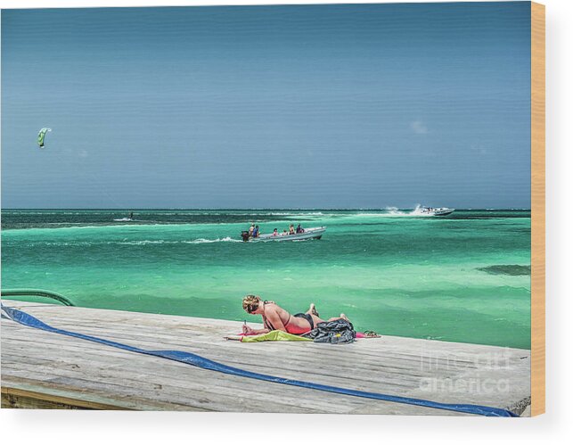 Caye Caulker Belize Wood Print featuring the photograph Curious Bikini Clad Sunbather by David Zanzinger
