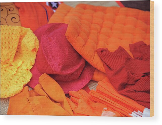 Orange Wood Print featuring the photograph Display of Orange and Red Clothing by Jenny Rainbow