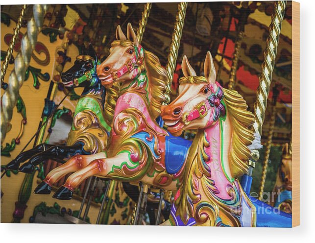 Amusement Ride Wood Print featuring the photograph Fairground Carousel Horses by Paul Warburton
