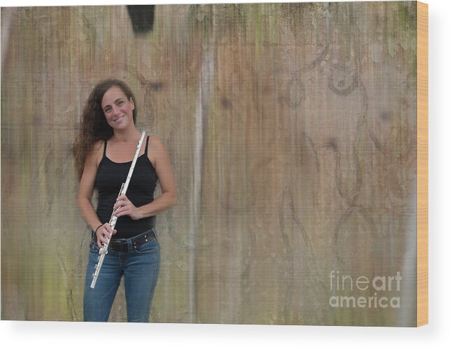 Nina Assimakopoulos Wood Print featuring the photograph Flute player at the wall by Dan Friend