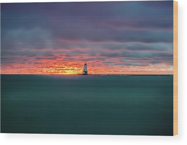 Ludington Mi Wood Print featuring the photograph Glowing Sunset on Lake With Lighthouse by Lester Plank