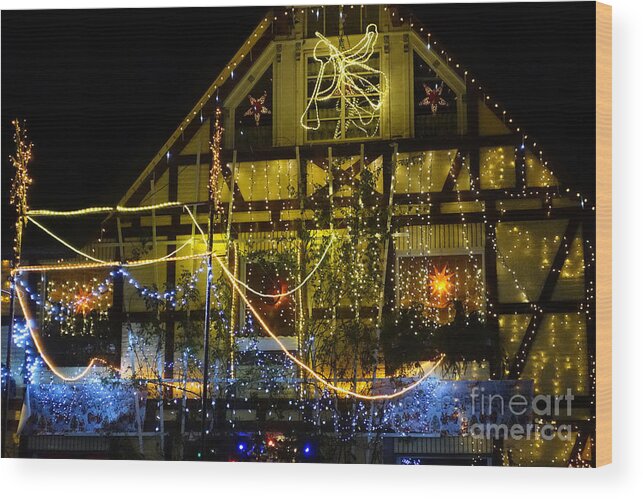 Christmas Wood Print featuring the photograph Illuminated Christmas-House by Eva-Maria Di Bella