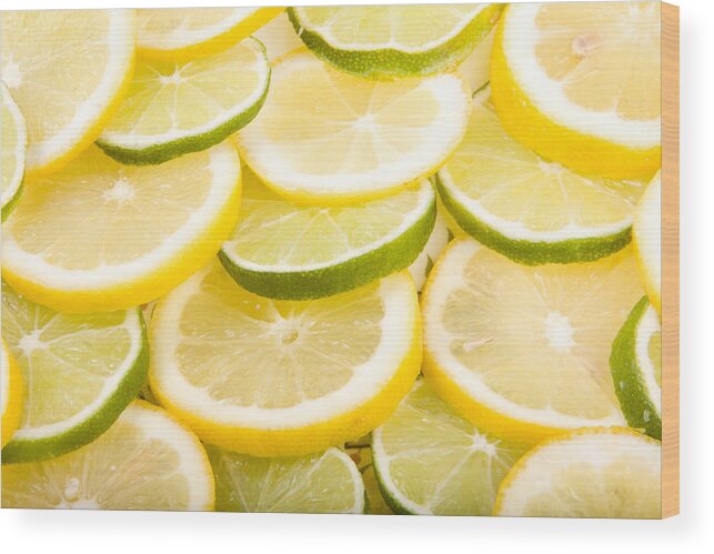 Lemons; Citrus; Citrus Fruit; Citrus Fruits; Close Up; Cross Section; Culinary; Food; Fruit; Fruits; Green; Key Lime; Key Limes; Lime; Limes; Slice; Sliced; Slices; Group; Sour Wood Print featuring the photograph Lemons and Limes by James BO Insogna