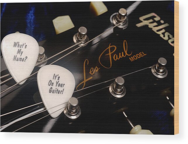 Les Paul Wood Print featuring the photograph Les Paul's guitar pick on Gibson headstock by Gene Martin by David Smith