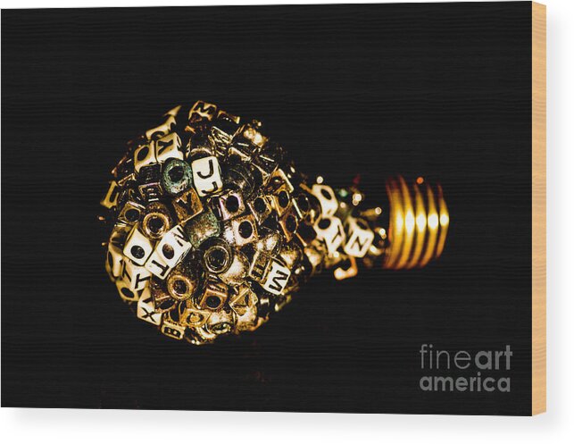 Light Bulb Wood Print featuring the photograph Light bulb of letters by Gerald Kloss