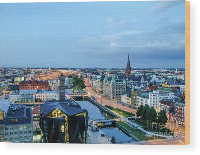 Buildings Wood Print featuring the photograph Malmo by Night, Sweden by Amanda Mohler