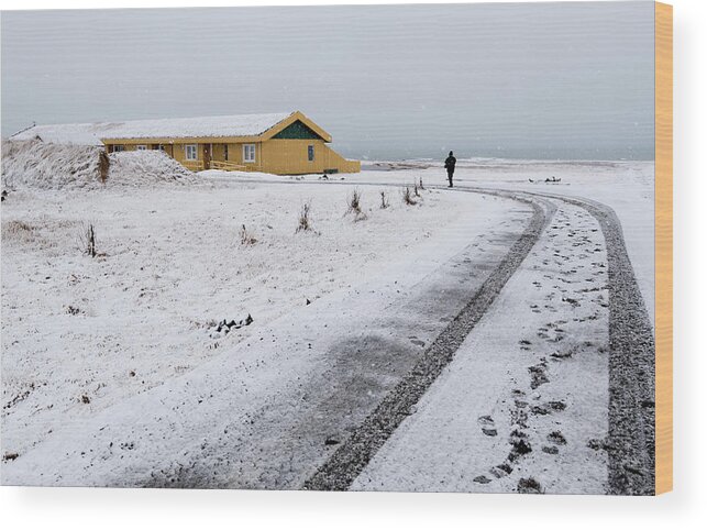 Iceland Wood Print featuring the photograph Man walking in snow Iceland by Michalakis Ppalis