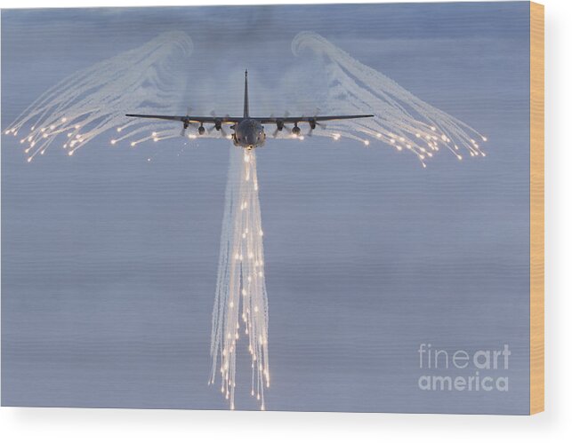 Mc-130 Wood Print featuring the photograph Mc-130h Combat Talon Dropping Flares by Gert Kromhout
