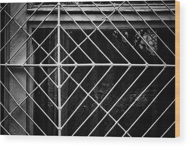 Wall Art Wood Print featuring the photograph Metal Spider Web Windowframe in Monochrome by John Williams