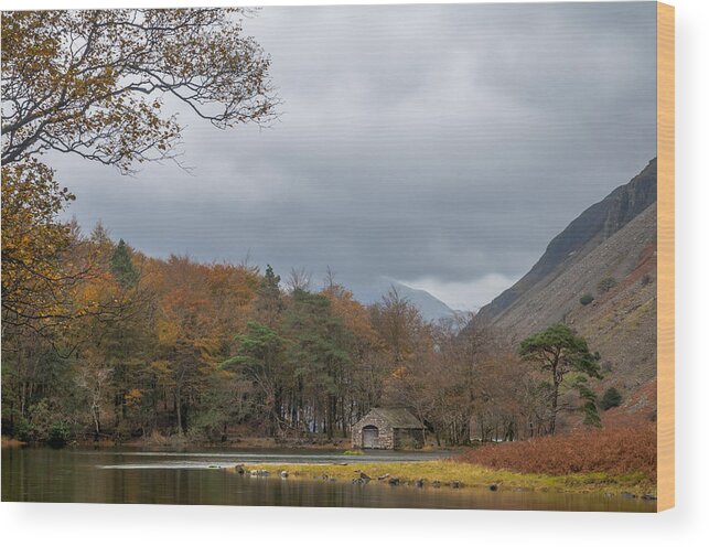 Autumn Wood Print featuring the photograph Moody clouds over a boathouse on Wast Water in the Lake District by Neil Alexander Photography