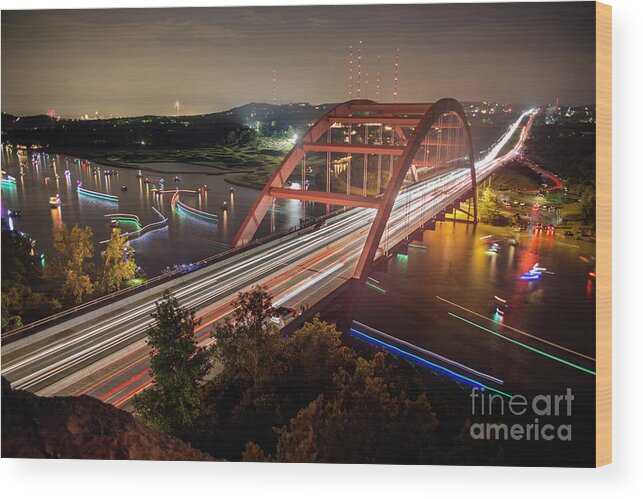 Loop 360 Boat Ramp Park Wood Print featuring the photograph Nighttime boats cruise up and down the Loop 360 Bridge, a boater by Dan Herron