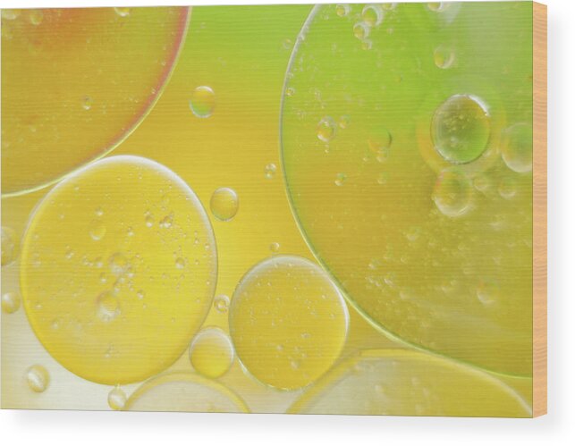 Water Wood Print featuring the photograph Oil and water bubbles by Andy Myatt