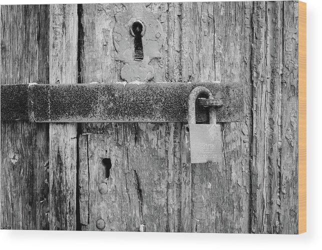 Padlock On An Old Wooden Door Wood Print featuring the photograph Padlock On An Old Wooden Door by Marco Oliveira