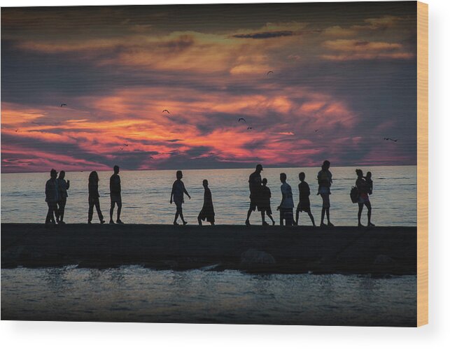 Art Wood Print featuring the photograph People walking on the Breakwater at Ottawa Beach at Sunset by Randall Nyhof