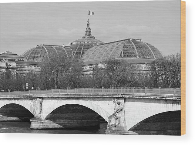 Pont Des Invalides Wood Print featuring the photograph Pont Des Invalides in front of Glass Roof of Beaux Arts Grand Palais Paris France Black and White by Shawn O'Brien