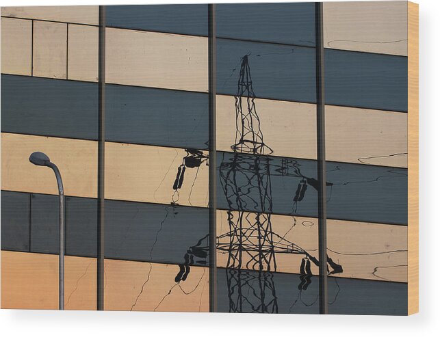 Electricity Tower Wood Print featuring the photograph Reflection of Electricity Tower by Prakash Ghai