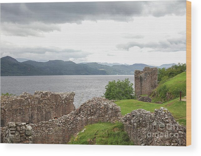 Ancient Wood Print featuring the photograph Ruins of Urquhart castle by Patricia Hofmeester