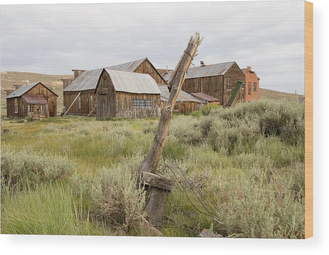 Abandoned Wood Print featuring the photograph Rustic wooden structures in Bodie, California by Karen Foley