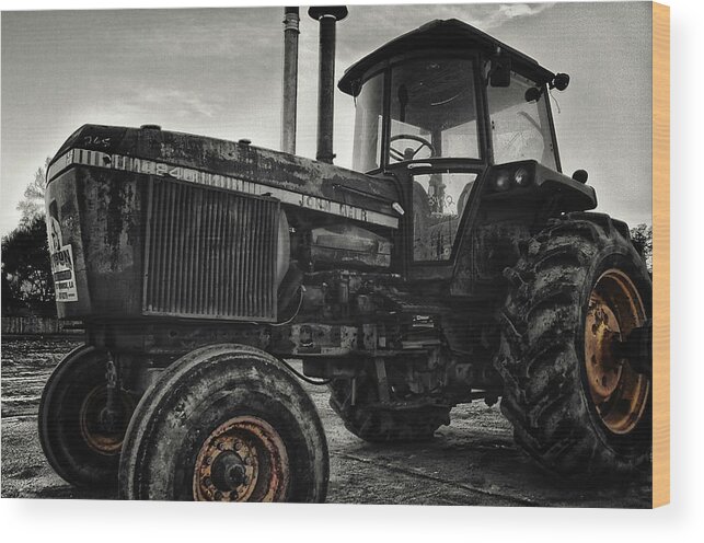 John Deere Tractor Wood Print featuring the photograph Rusty Yellow-Rimmed Tractor by Eugene Campbell