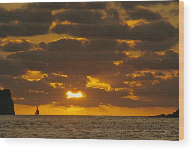 Sil Wood Print featuring the photograph Sailboat as the Sun Sets by John Harmon