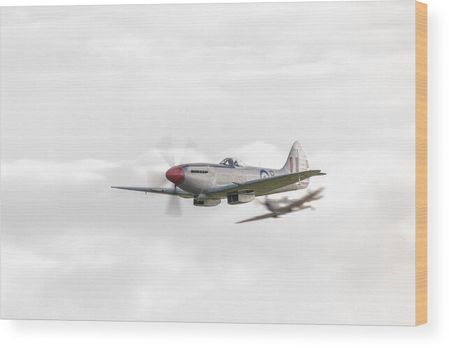 Silver Spitfire Wood Print featuring the photograph Silver Spitfire in a cloudy sky by Gary Eason