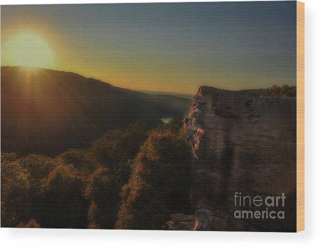Rock Climber Wood Print featuring the photograph Skilled climber in evening sun by Dan Friend