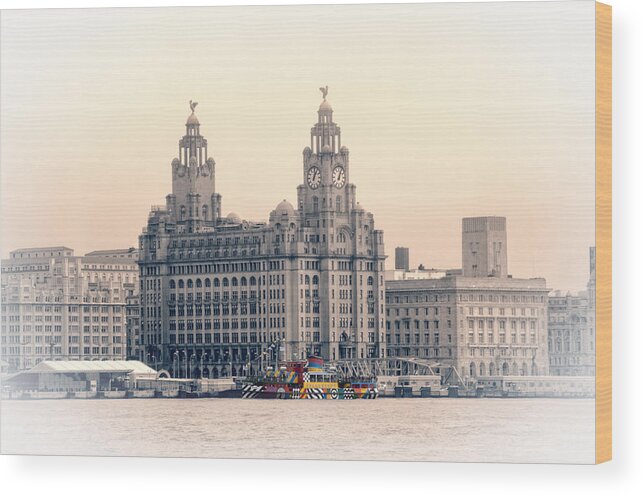 Pier Wood Print featuring the photograph Snowdrop Dazzles in front of the Liverbirds by Spikey Mouse Photography