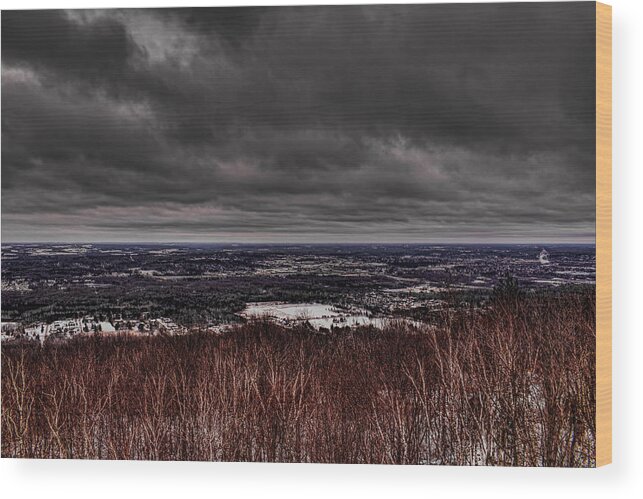 Winter Wood Print featuring the photograph Snowstorm Clouds Over Rib Mountain State Park by Dale Kauzlaric