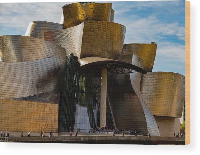 Spain Bilbao Guggenheim Museum Basque Country Frank Gehry Contemporary Architecture Nervion River City Daring And Innovative Curves Building Exterior Spectacular Building Deconstructivism Ferrovial Clad In Glass Wood Print featuring the photograph The Guggenheim Museum Spain Bilbao by Andy Myatt