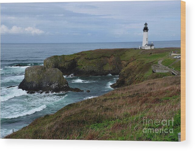 Denise Bruchman Wood Print featuring the photograph Stormy Yaquina Head Lighthouse by Denise Bruchman