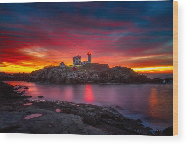 Sunrise Wood Print featuring the photograph Sunrise over Nubble Light by Darren White