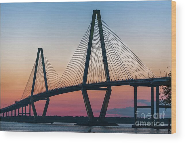 Arthur Ravenel Jr. Bridge Wood Print featuring the photograph Sunset Glow over the Cooper River Bridge by Dale Powell