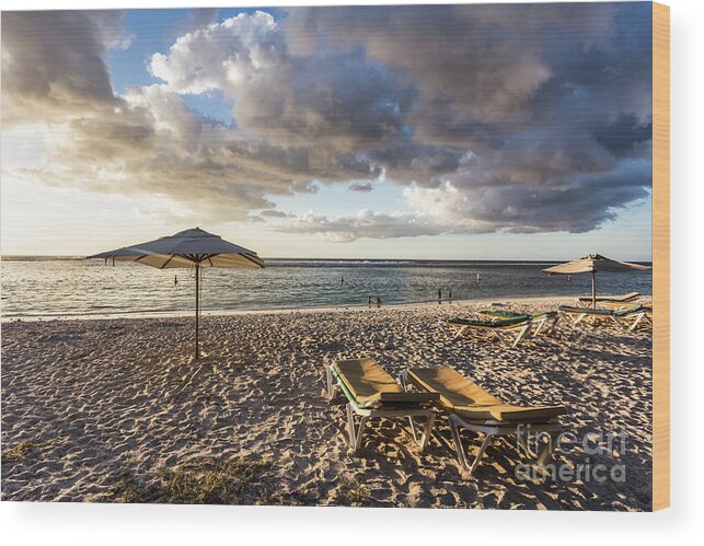 Africa Wood Print featuring the photograph Sunset over Flic en Flac beach in Mauritius. by Didier Marti