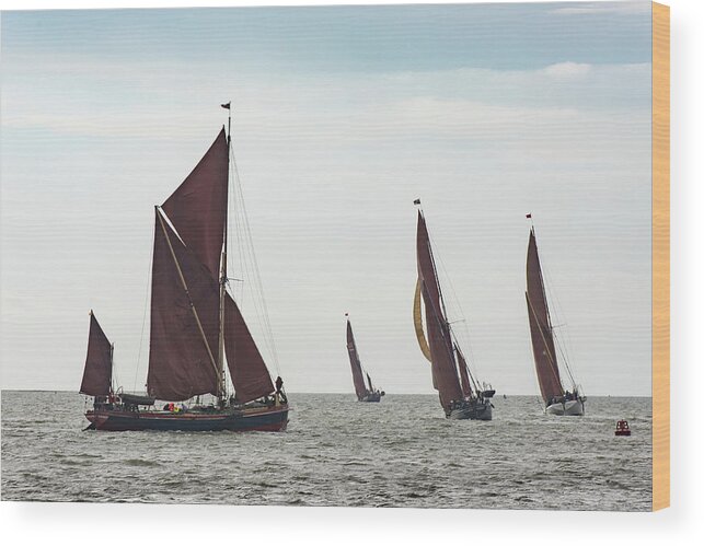 Thames Sailing Barges Wood Print featuring the photograph Thames sailing barges tacking by Gary Eason