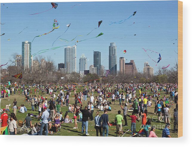 Zilker Park Kite Festival Wood Print featuring the photograph The Zilker Park Kite Festival is an annual event the longest consecutive running Kite Festival in the country by Dan Herron