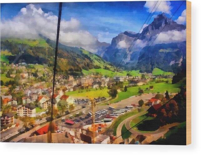 Cable Car Wood Print featuring the photograph View of town below a cable car in Switzerland by Ashish Agarwal