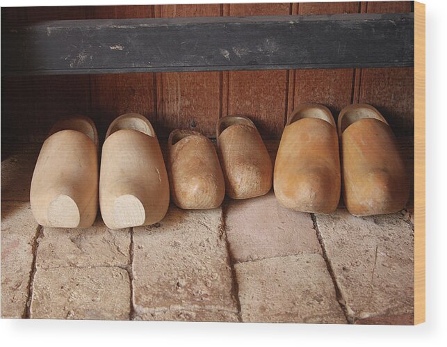 Clogs Wood Print featuring the photograph Wooden clogs by Emanuel Tanjala