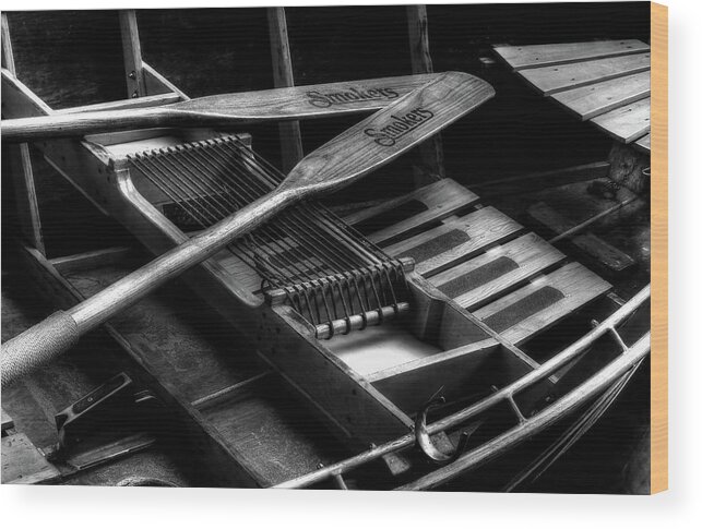 Wooden Rowboat Wood Print featuring the photograph Wooden Rowboat And Oars In Black And White by Carol Montoya