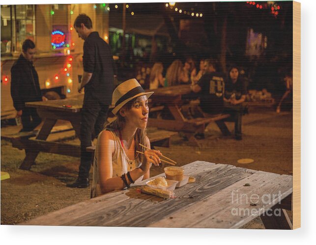 Attractive Wood Print featuring the photograph Young attractive Austin local eats at an East Austin food trailer park by Dan Herron