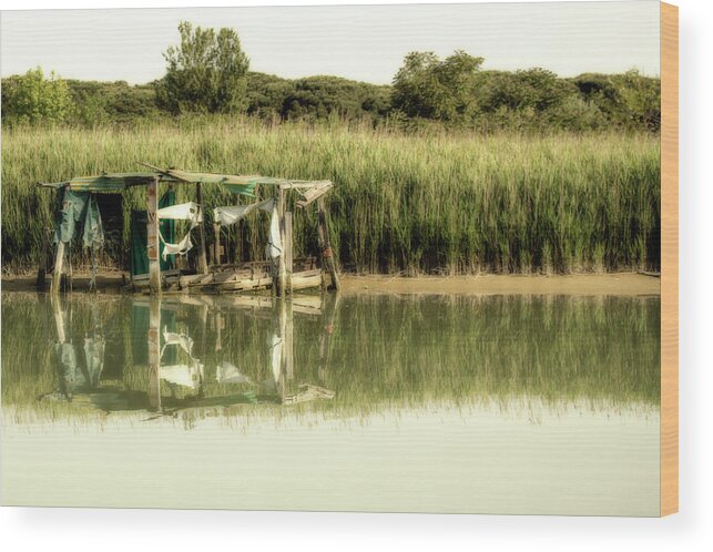 Shack Wood Print featuring the photograph Fishing shack on sea channel #1 by Vivida Photo PC