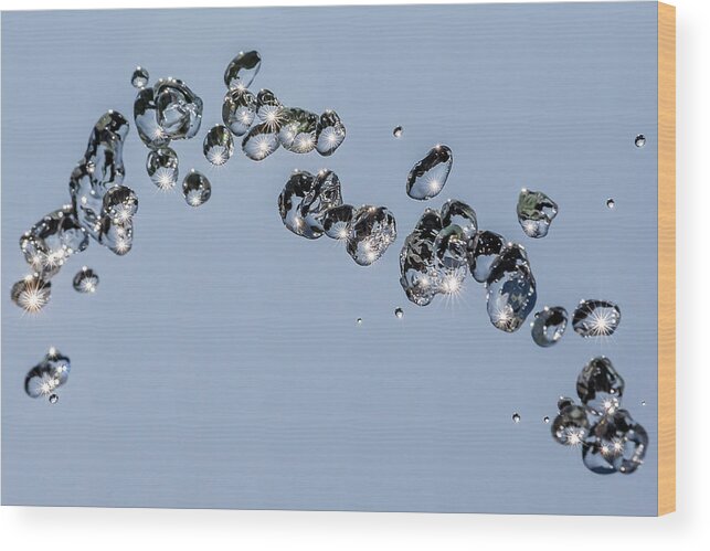 Wolfgang Stocker Wood Print featuring the photograph Flying drops #1 by Wolfgang Stocker