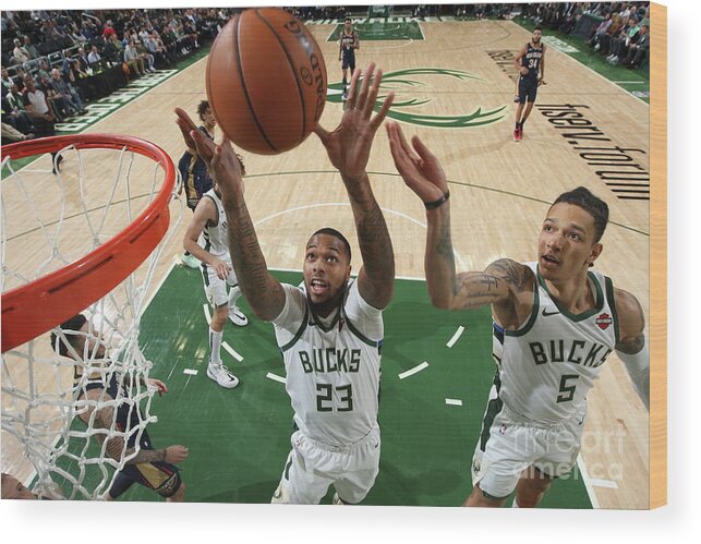 Nba Pro Basketball Wood Print featuring the photograph New Orleans Pelicans V Milwaukee Bucks by Gary Dineen