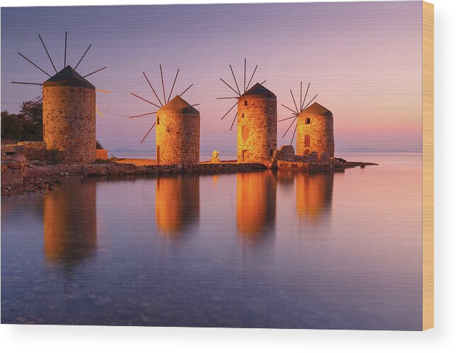 Greece Wood Print featuring the photograph Sunrise Image Of The Iconic Windmills In Chios Town. #1 by Cavan Images